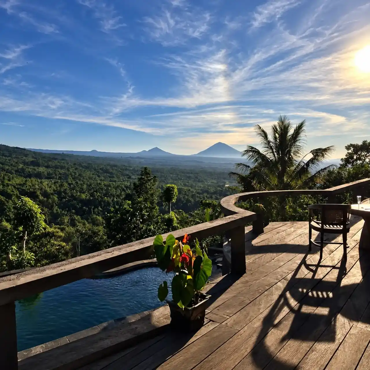 Cahaya senja di atas kebun teh dan atap vila